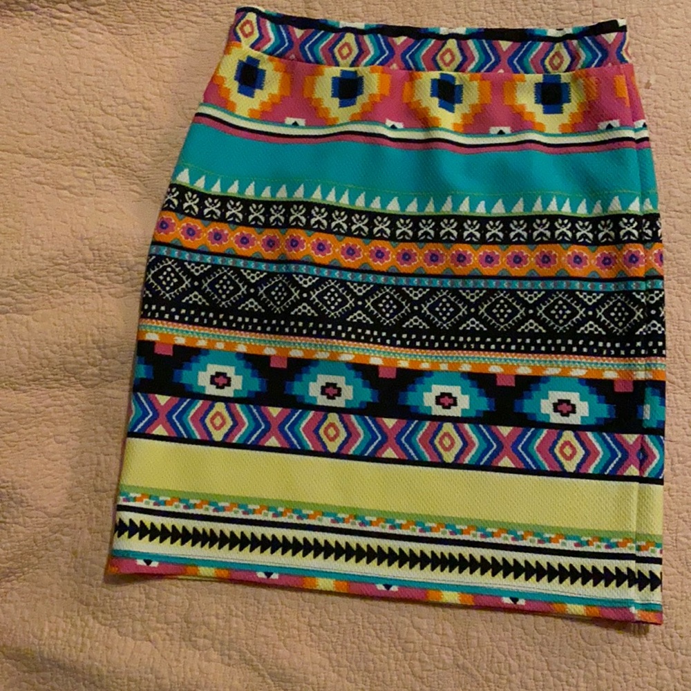 Sunny Leigh size small mini skirt in excellent condition; multi colored design